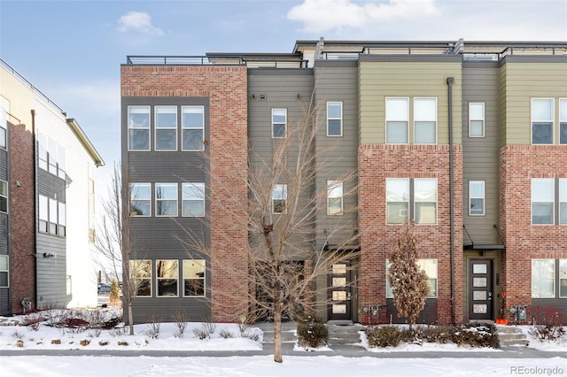 view of snow covered building