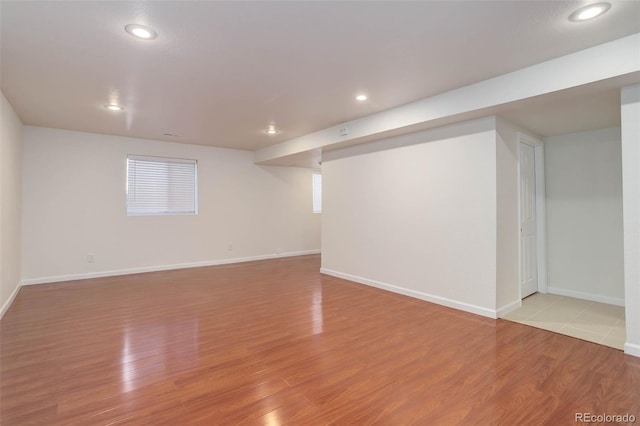 6055 W Warren, Lakewood, CO 80227 - below grade area featuring light wood finished floors and recessed lighting