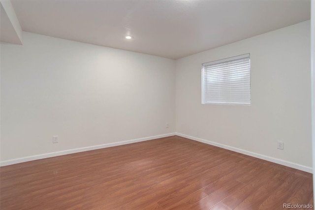 6055 W Warren, Lakewood, CO 80227 - spare room featuring wood finished floors and recessed lighting