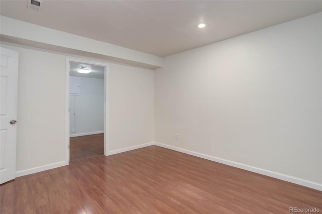 6055 W Warren, Lakewood, CO 80227 - empty room with wood finished floors and recessed lighting