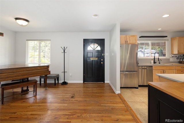 745 S Glencoe St, Denver, CO 80246 - entrance foyer with plenty of natural light, light wood-style flooring, and recessed lighting