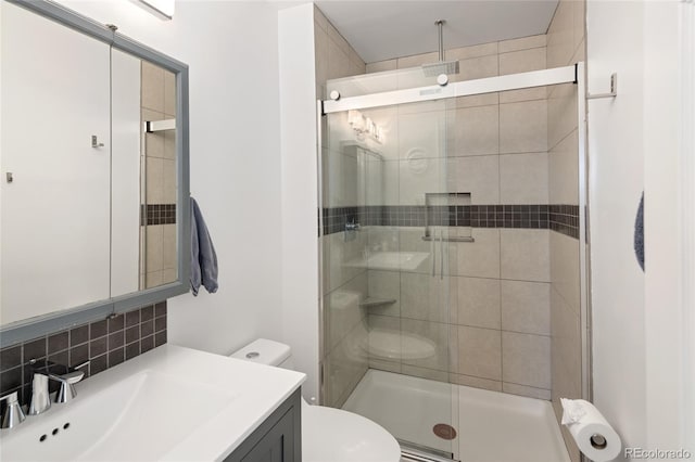 745 S Glencoe St, Denver, CO 80246 - bathroom with vanity, a shower stall, and decorative backsplash