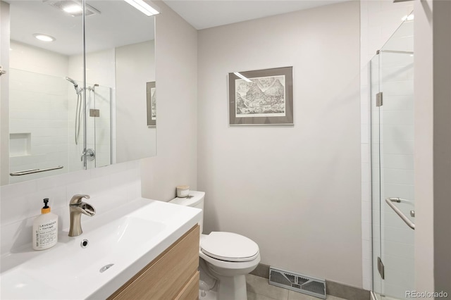 745 S Glencoe St, Denver, CO 80246 - bathroom with a stall shower, vanity, and tile patterned floors