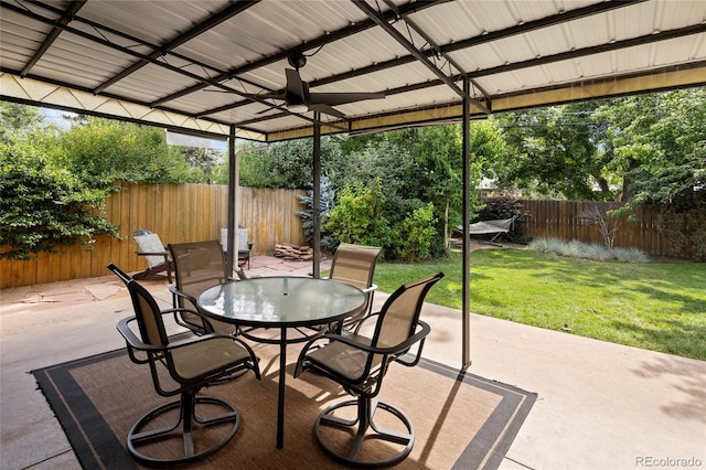 745 S Glencoe St, Denver, CO 80246 - fenced backyard with a ceiling fan, a patio area, and outdoor dining area