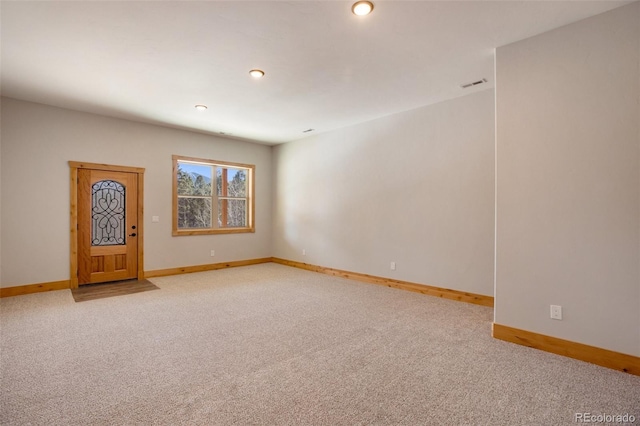 interior space featuring light colored carpet