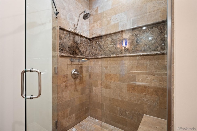 bathroom featuring tiled shower