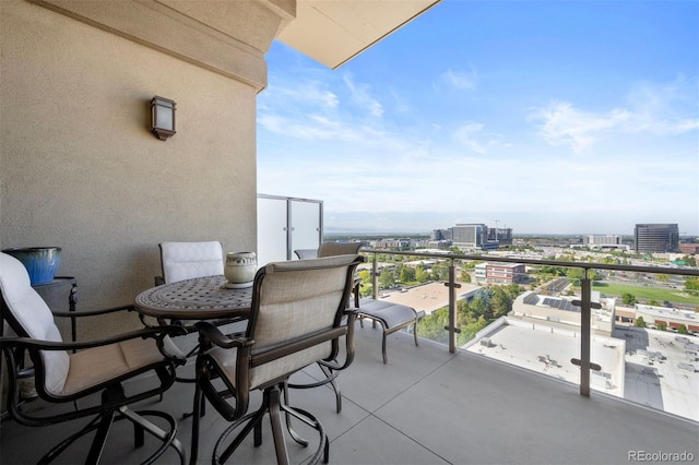 balcony featuring a city view