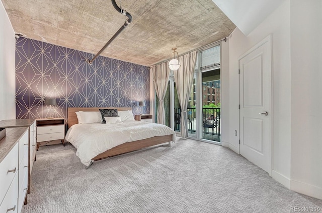 1700 Bassett St Unit 101, Denver, CO 80202 - bedroom with carpet flooring, access to outside, and baseboards