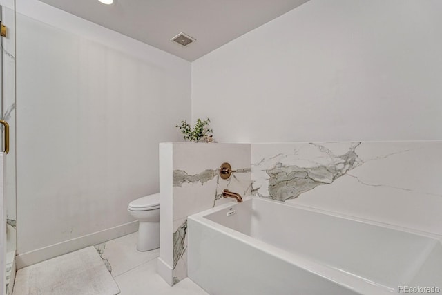 1700 Bassett St Unit 101, Denver, CO 80202 - bathroom with a bath, baseboards, toilet, and marble look tiles