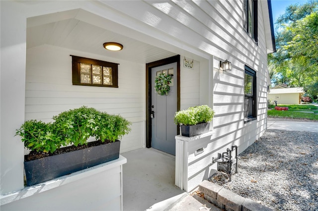 property entrance featuring a garage