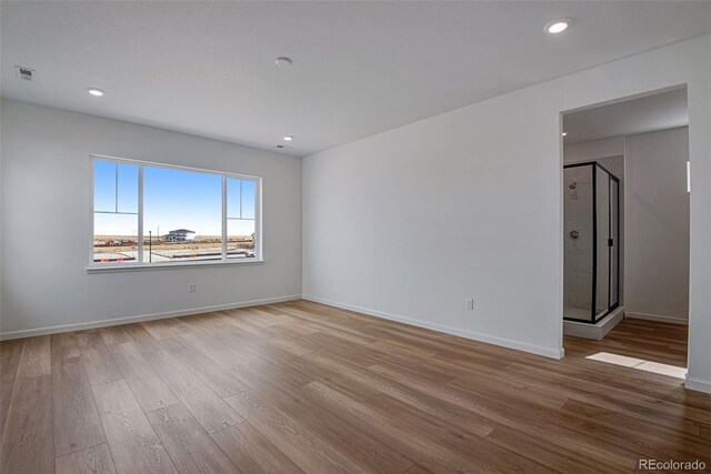 unfurnished room featuring wood-type flooring