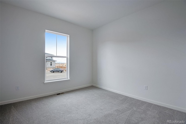 view of carpeted spare room