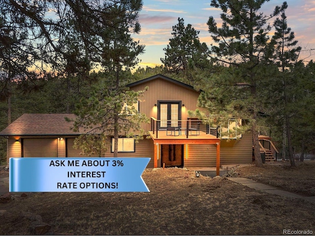 30938 Niakwa Rd, Evergreen, CO 80439 - exterior space featuring a wooden deck and french doors