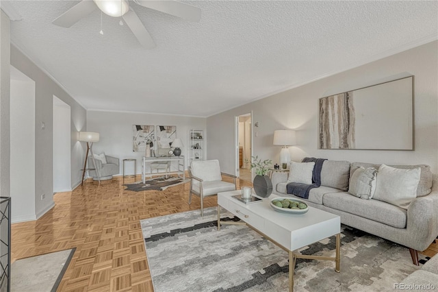 4800 E Hale Pkwy Unit 802N, Denver, CO 80220 - living area with a textured ceiling, ceiling fan, ornamental molding, and baseboards
