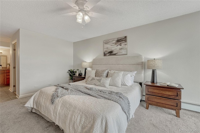 4800 E Hale Pkwy Unit 802N, Denver, CO 80220 - carpeted bedroom with a textured ceiling, baseboard heating, a baseboard radiator, baseboards, and a ceiling fan