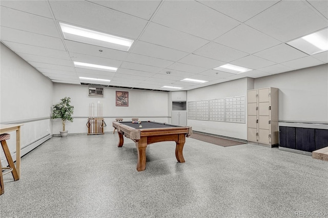 4800 E Hale Pkwy Unit 802N, Denver, CO 80220 - recreation room with speckle patterned floor, a drop ceiling, pool table, and a baseboard heating unit