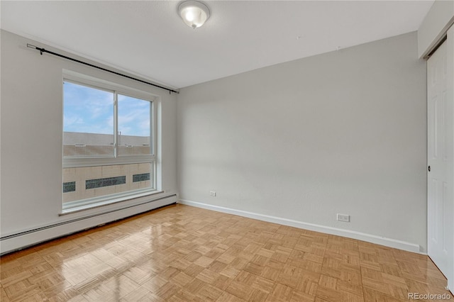 4800 E Hale Pkwy Unit 802N, Denver, CO 80220 - unfurnished room with a baseboard radiator and baseboards