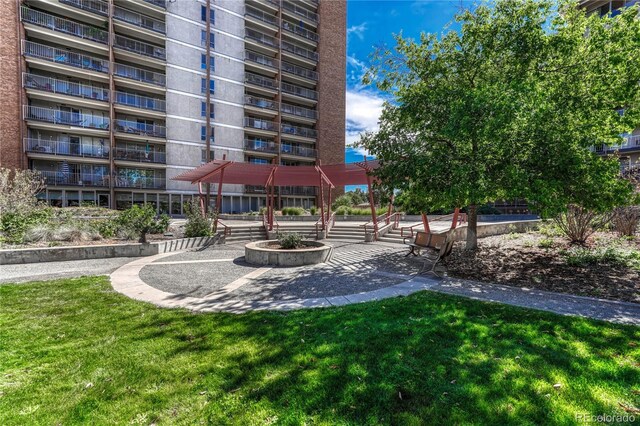 4800 E Hale Pkwy Unit 802N, Denver, CO 80220 - view of property's community with a yard