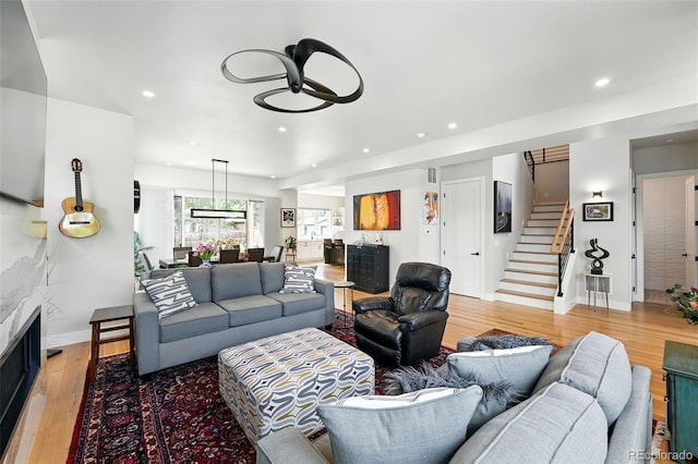 2635 Pierce St, Wheat Ridge, CO 80214 - living room featuring light wood-style floors, stairs, recessed lighting, and ceiling fan