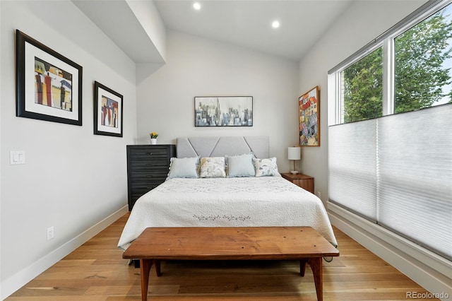 2635 Pierce St, Wheat Ridge, CO 80214 - bedroom featuring vaulted ceiling, recessed lighting, and light wood-style floors
