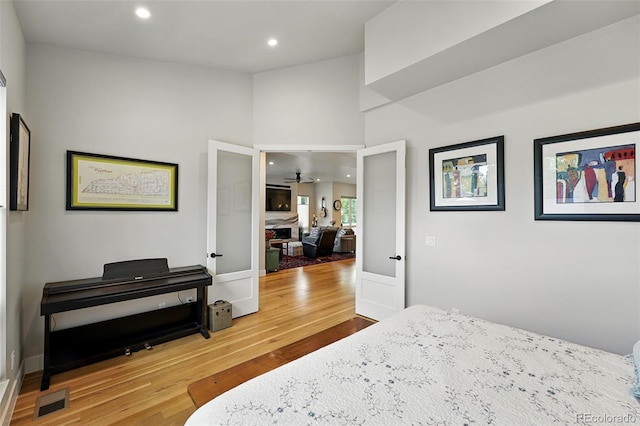 2635 Pierce St, Wheat Ridge, CO 80214 - bedroom with wood finished floors, recessed lighting, and french doors