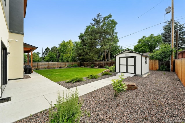 2635 Pierce St, Wheat Ridge, CO 80214 - fenced backyard with a shed and a patio area