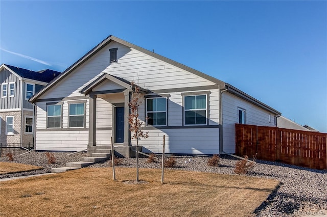 view of front of home featuring a front yard