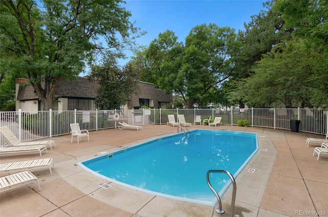 view of pool with a patio