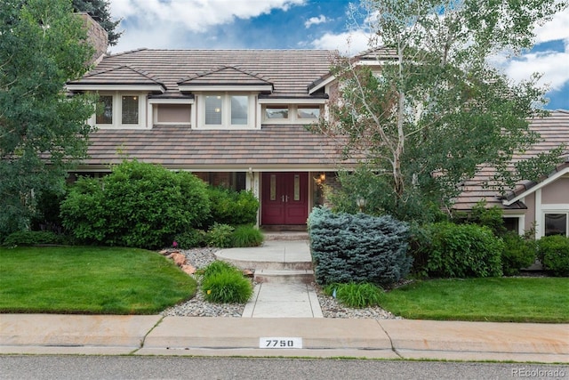 7750 S Glencoe Way, Centennial, CO 80122 - view of front facade with a front yard and a tiled roof