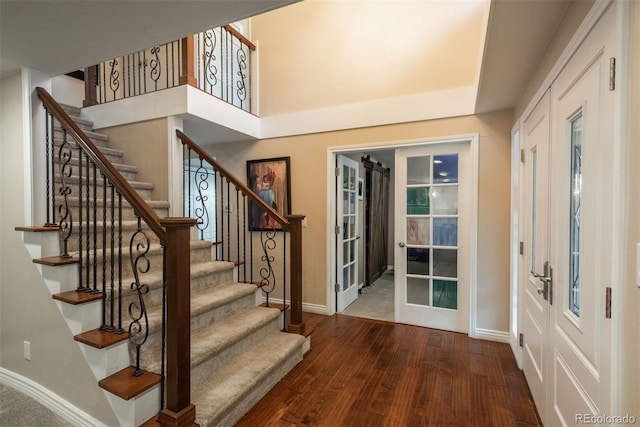 7750 S Glencoe Way, Centennial, CO 80122 - entryway featuring hardwood / wood-style floors, french doors, and stairs
