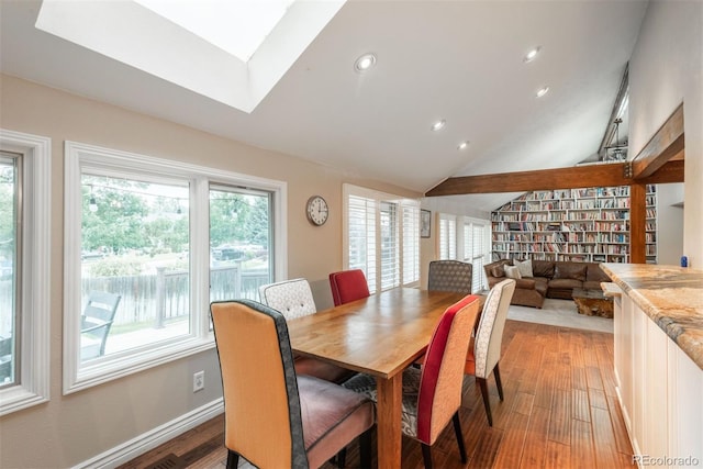 7750 S Glencoe Way, Centennial, CO 80122 - dining area with light wood finished floors, recessed lighting, a skylight, and vaulted ceiling