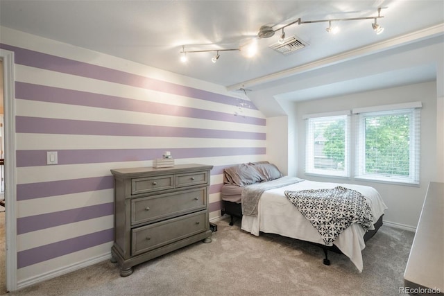 7750 S Glencoe Way, Centennial, CO 80122 - bedroom featuring rail lighting and light carpet