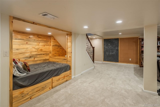 7750 S Glencoe Way, Centennial, CO 80122 - unfurnished bedroom featuring recessed lighting, carpet, and wood walls