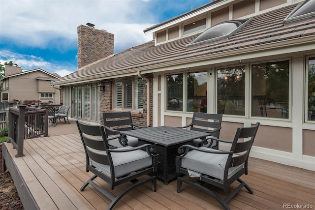 7750 S Glencoe Way, Centennial, CO 80122 - wooden terrace featuring outdoor dining space