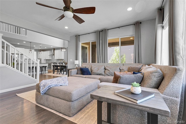 4781 Basalt Ridge Cir, Castle Rock, CO 80108 - living area featuring a ceiling fan, wood finished floors, stairs, recessed lighting, and baseboards