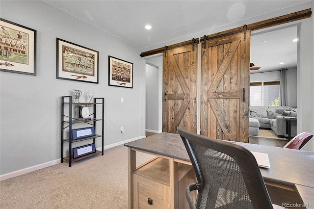 4781 Basalt Ridge Cir, Castle Rock, CO 80108 - carpeted office with a barn door, baseboards, and recessed lighting