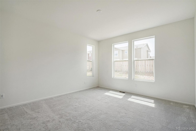 13392 E 110th Way, Commerce City, CO 80022 - carpeted empty room featuring baseboards