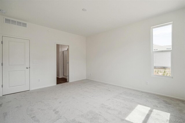 13392 E 110th Way, Commerce City, CO 80022 - carpeted spare room with baseboards and a smoke detector