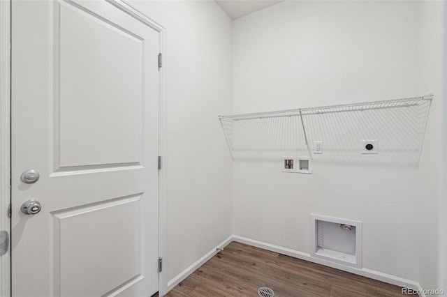 13392 E 110th Way, Commerce City, CO 80022 - washroom featuring hookup for an electric dryer, hookup for a washing machine, baseboards, and wood finished floors