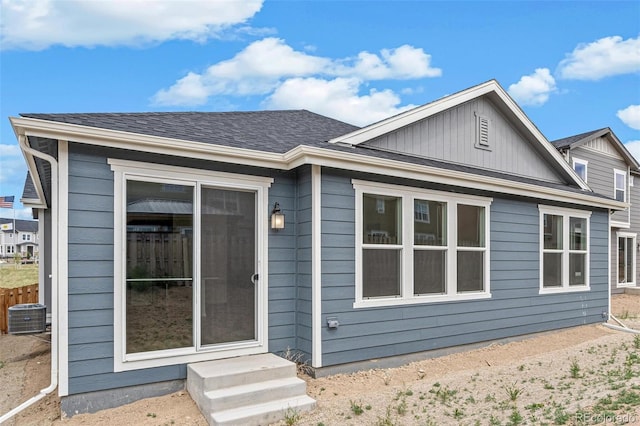 13392 E 110th Way, Commerce City, CO 80022 - back of house featuring central AC unit and board and batten siding