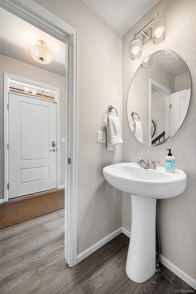 14833 E Crestridge Dr, Centennial, CO 80015 - bathroom featuring wood finished floors and baseboards
