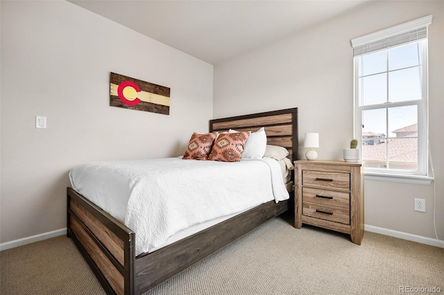 14833 E Crestridge Dr, Centennial, CO 80015 - bedroom featuring baseboards, light carpet, and multiple windows