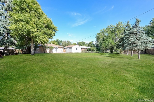 view of yard with fence