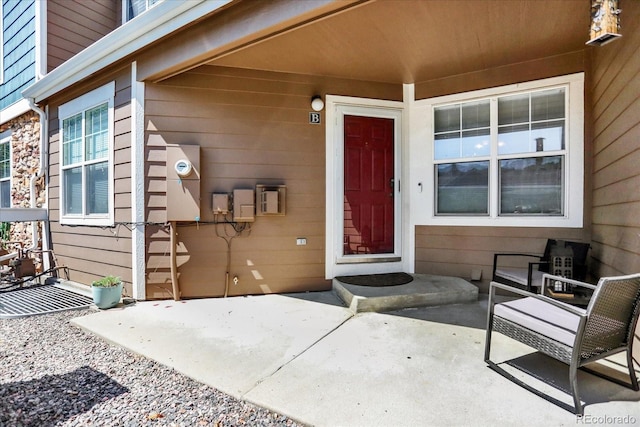 13271 Holly St Unit B, Thornton, CO 80241 - view of exterior entry featuring a patio
