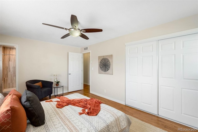 9325 Meade St, Westminster, CO 80031 - bedroom with wood finished floors, a closet, and a ceiling fan