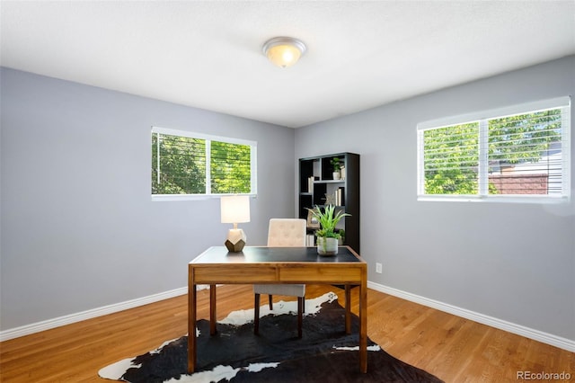9325 Meade St, Westminster, CO 80031 - office space featuring wood finished floors and baseboards