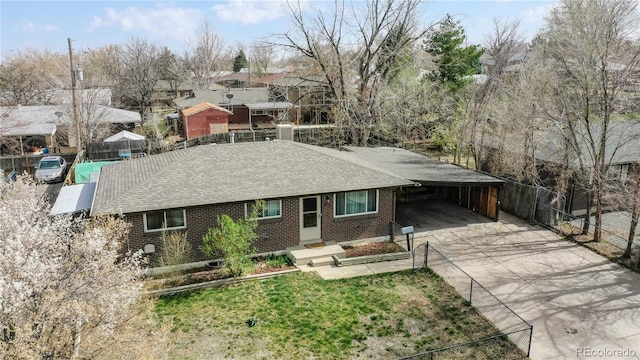 view of front of property featuring a carport