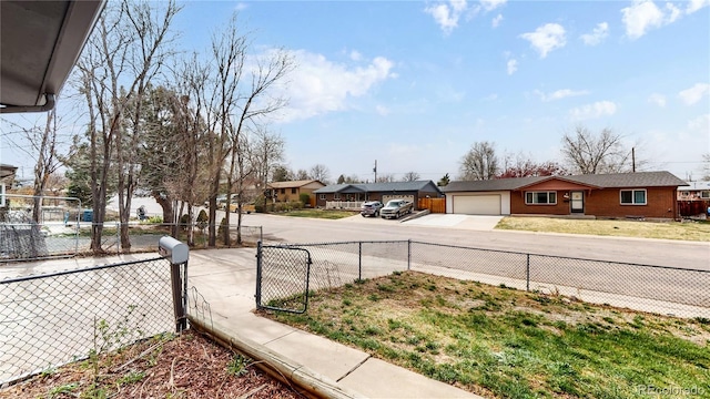 view of yard featuring a garage