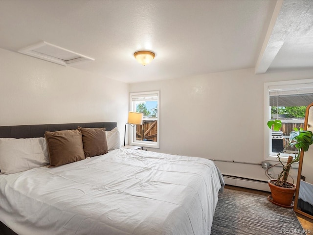 3134 W Center Ave, Denver, CO 80219 - bedroom with attic access, wood finished floors, and baseboard heating