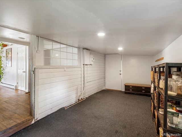 3134 W Center Ave, Denver, CO 80219 - interior space with a baseboard radiator and dark colored carpet